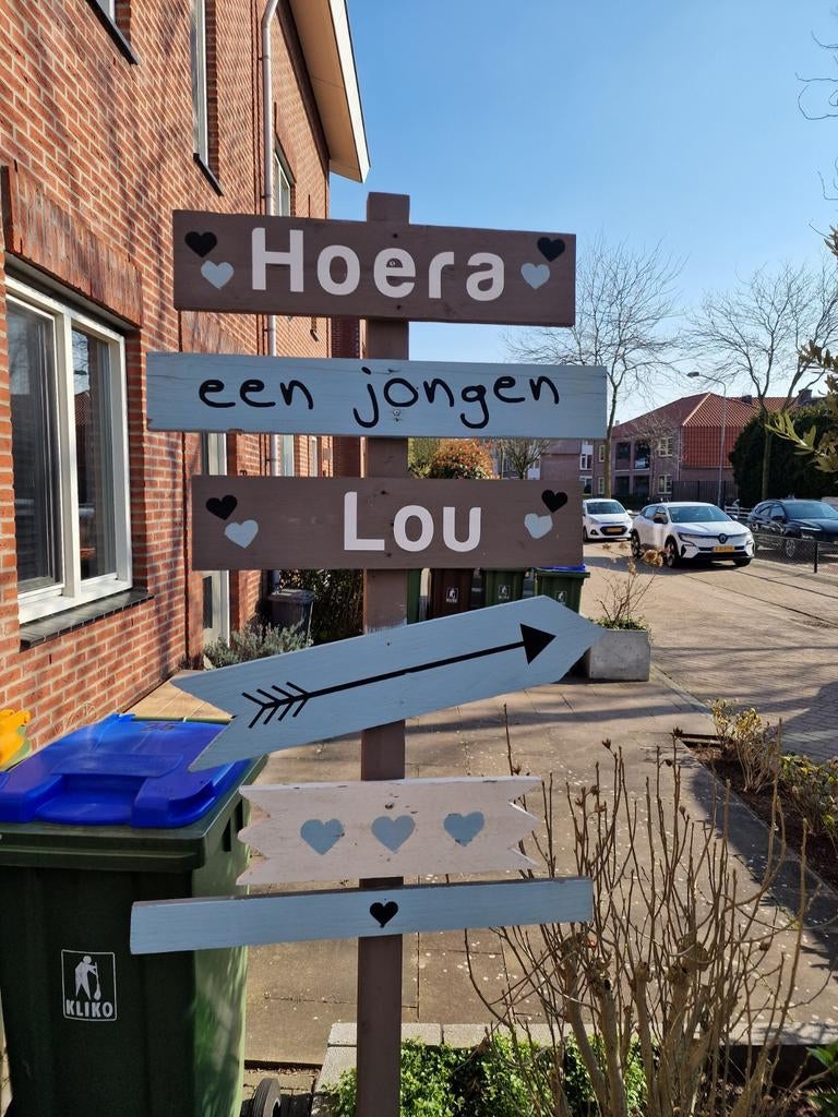 Houten geboortebord jongen, Ophalen