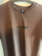 Bruin T-shirt met 'Chaotic' print - Maat XXS, Bruin, Ophalen of Verzenden, Zo goed als nieuw, Korte mouw