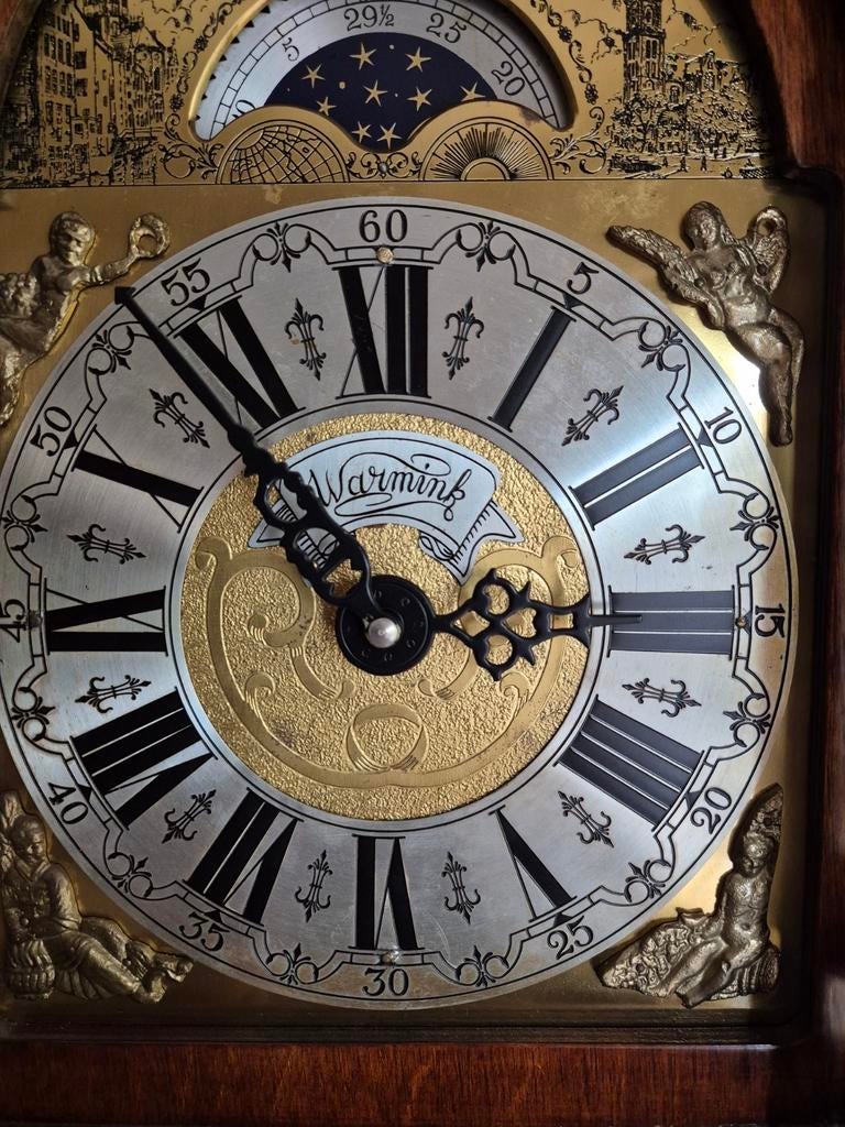 Warmink staande klok, Ophalen