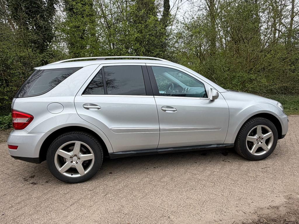 Mercedes-Benz M-Klasse 3.5 Ml350 4MATIC AUT 2009 Grijs, Auto's, Automaat, Origineel Nederlands, 272 pk, Vierwielaandrijving