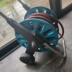 Tuinslang Gardena met haspel op wielen, Ophalen