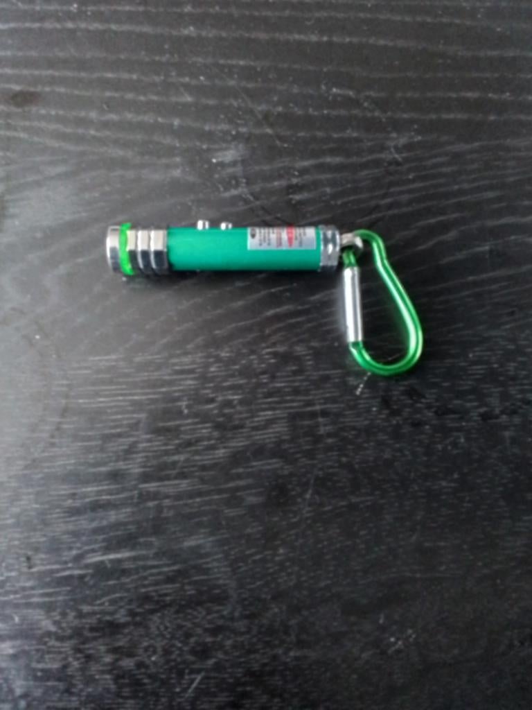 Groene laser met aan/uit knop en lampje, Ophalen