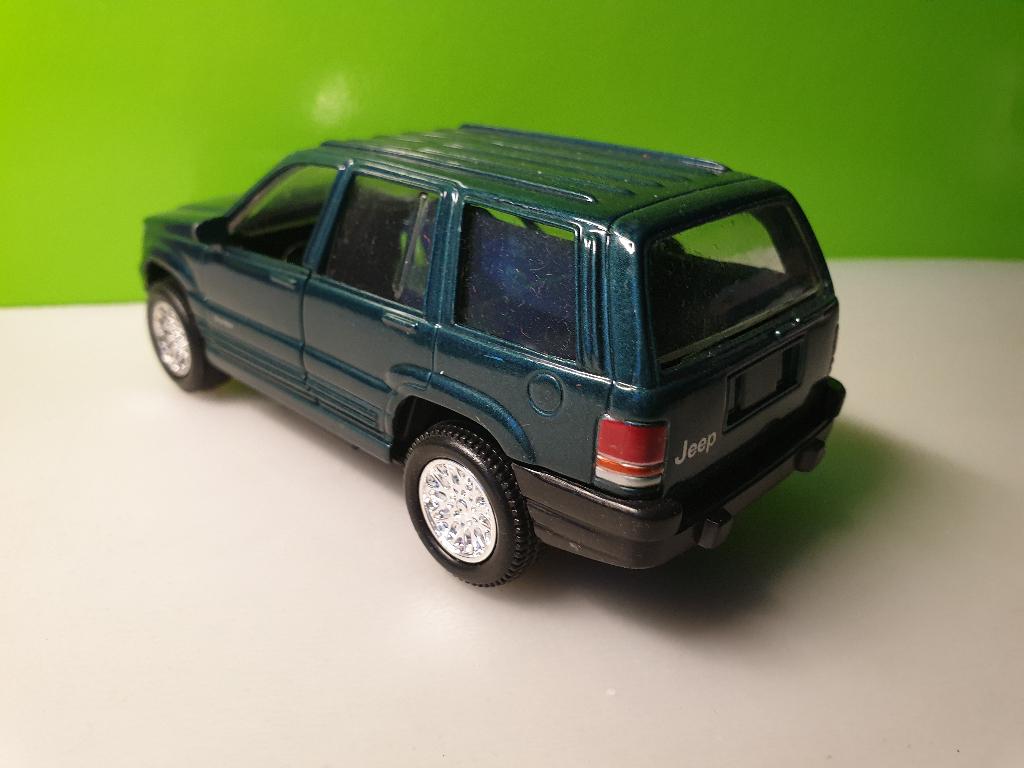 New Ray - Jeep Grand Cherokee [groen] 1/32, Hobby en Vrije tijd, Ophalen of Verzenden, Gebruikt, Auto
