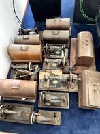 Assorti antieke naaimachines, Ophalen