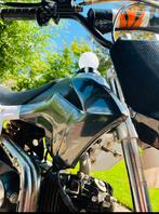 Waardepeiling 125 cc crossmotor met carbon kappen, Ophalen, Overige merken