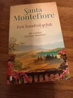 Santa Montefiore  Een handvol geluk, Boeken, Romans, Ophalen of Verzenden, Zo goed als nieuw