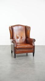 Grote schapenleren oorfauteuil met een warme kleurstelling, Huis en Inrichting, Fauteuils, Ophalen, Gebruikt, ., Klassiek