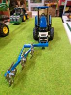 New Holland 8560 met duw-ploeg combinatie van Britains, Ophalen of Verzenden, Zo goed als nieuw, Tractor of Landbouw, Britains
