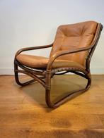 Vintage rotan fauteuil met leren kussens uit 1970, Huis en Inrichting, Fauteuils, Ophalen, Gebruikt, 75 tot 100 cm, Leer