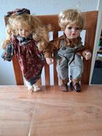 TK 2 PORSELEINEN POPPEN JONGEN EN MEISJE. CA 30CM GROOT, Ophalen of Verzenden, Zo goed als nieuw, Overige typen