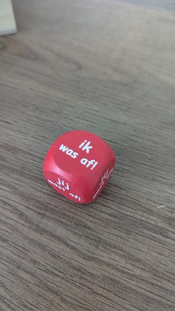 Dobbelsteen “Ik was af / jij wast af”, Hobby en Vrije tijd, Feestartikelen, Nieuw, Overige typen, Overige, Ophalen of Verzenden