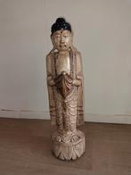 Houten Boeddhabeeld, Ophalen