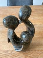 beeldje van gezin, Ophalen