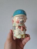 Opa van keramiek in schommelstoel spaarpot 6.5x8x13cm, Verzamelen, Spaarpotten, Ophalen of Verzenden, Zo goed als nieuw, Steen, Aardewerk of Keramiek