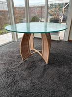 Ronde eettafel met rieten onderstel en glazen blad, Huis en Inrichting, Tafels | Eettafels, Ophalen, Gebruikt, 100 tot 150 cm