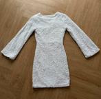 Fashiontiger glowy dress feestjurk glitter wit S/M, Kleding | Dames, Jurken, Wit, Ophalen of Verzenden, Zo goed als nieuw, Maat 34 (XS) of kleiner