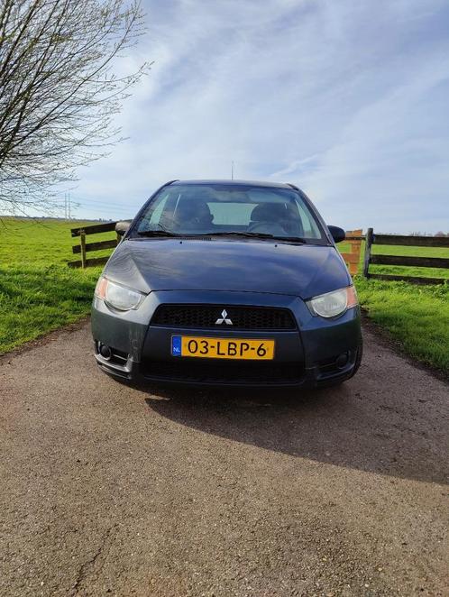 Mitsubishi Colt 1.1 5-DR 2010 Grijs in zeer goede staat!, Auto's, Mitsubishi, Particulier, Colt, ABS, Airconditioning, Centrale vergrendeling