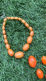 Antieke Barnstenen Ketting uit plm 1925. Oranje kleur.70 cm., Sieraden, Tassen en Uiterlijk, Antieke sieraden, Ophalen of Verzenden