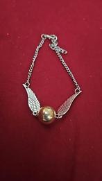 Harry Potter golden Snitch, Ophalen of Verzenden, Zo goed als nieuw, Goud