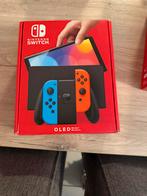 Nintendo Switch OLED - Blauw/Rood NIEUW IN DOOS, Spelcomputers en Games, Spelcomputers | Nintendo Switch, Ophalen of Verzenden