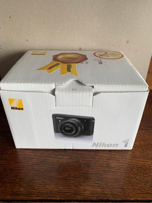 Nikon 1 J1 Zwart VERKOCHT, Audio, Tv en Foto, Fotocamera's Digitaal, Gebruikt, Nikon, Ophalen of Verzenden