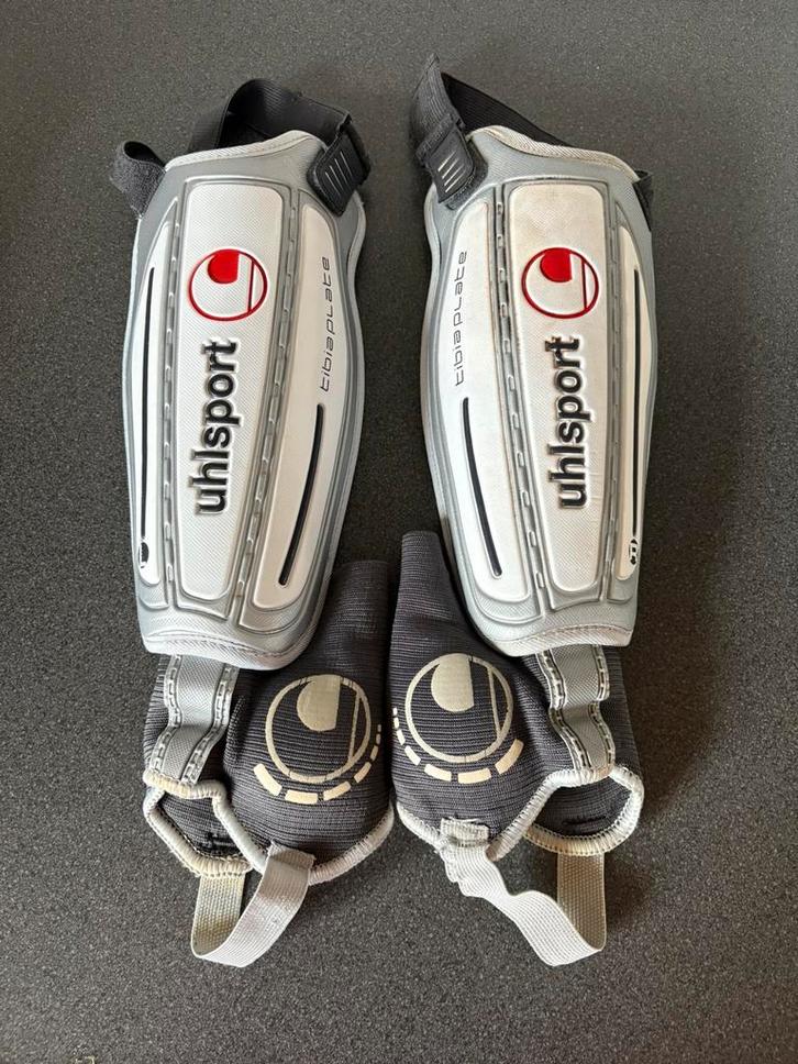 Uhlsport scheenbeschermers maat L, Sport en Fitness, Voetbal, Gebruikt, Overige typen, Maat L, Ophalen of Verzenden