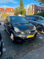 Toyota Aygo 1.0 12V Vvt-i 5DRS 2009 Zwart, Voorwielaandrijving, Stof, 4 stoelen, Grijs