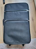 Zwarte reiskoffer, Ophalen, Hard kunststof