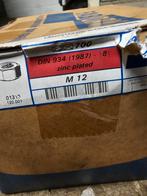 grote doos M12 moeren nieuw staal ongeveer 700x, Doe-het-zelf en Verbouw, Ophalen of Verzenden, Zo goed als nieuw, Bouten of Moeren
