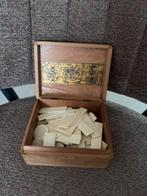 Serie van benen / ivoren fiches rond 1940, Ophalen