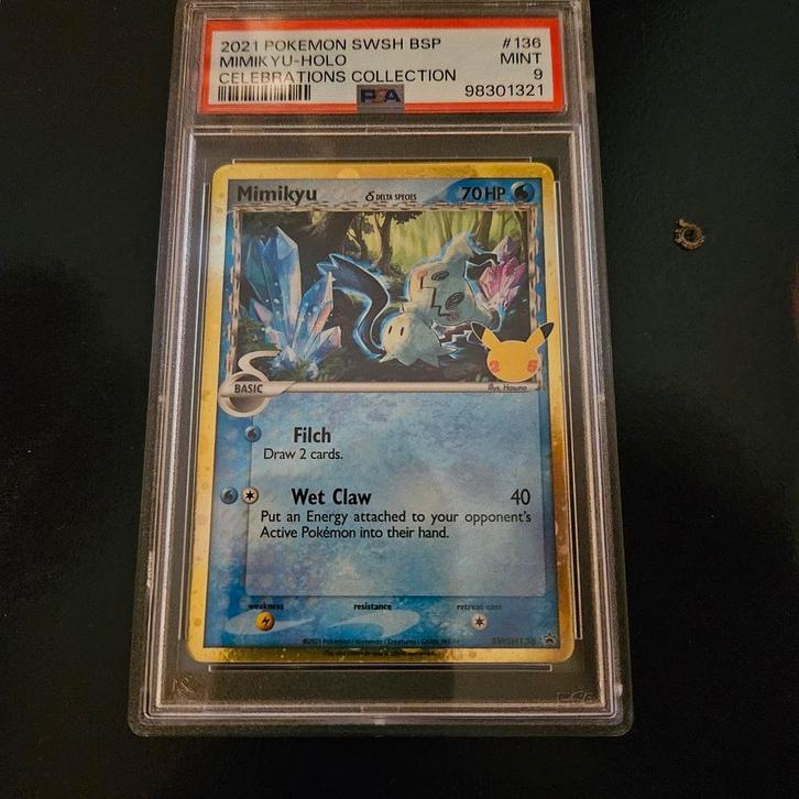 Mimikyu celebrations promo cosmos holo psa 9, Hobby en Vrije tijd, Verzamelkaartspellen | Pokémon, Zo goed als nieuw, Ophalen of Verzenden