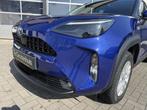 Toyota Yaris Cross 1.5 Hybrid Comfort Automaat | Trekhaak |, Auto's, Toyota, Stof, Gebruikt, Blauw, 23 km/l