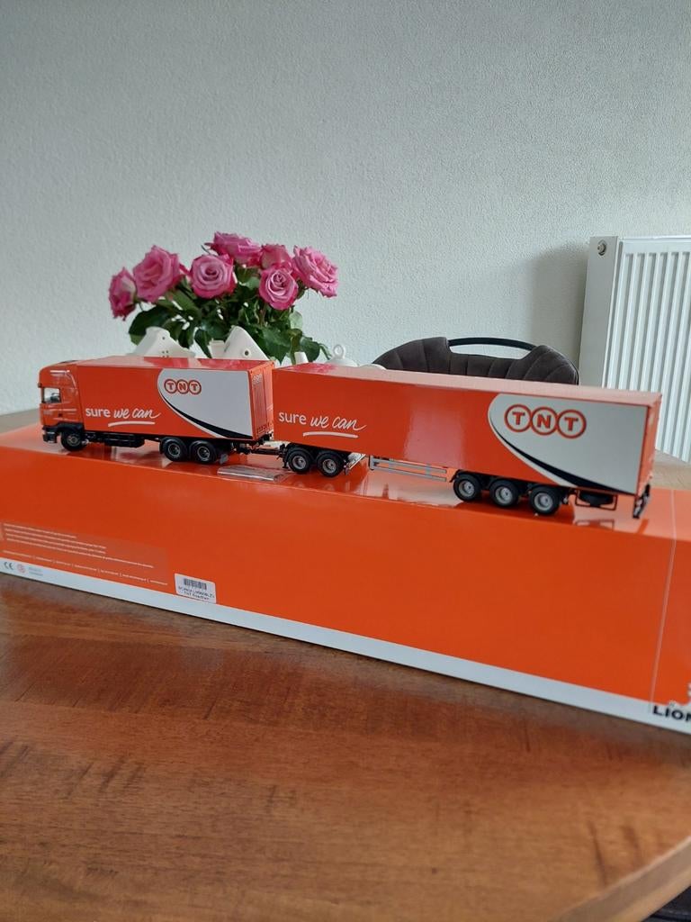 Scania LZV Neuw in doos TNT  zie foto's, Ophalen of Verzenden, Groter dan 1:32, Truck, Overige merken
