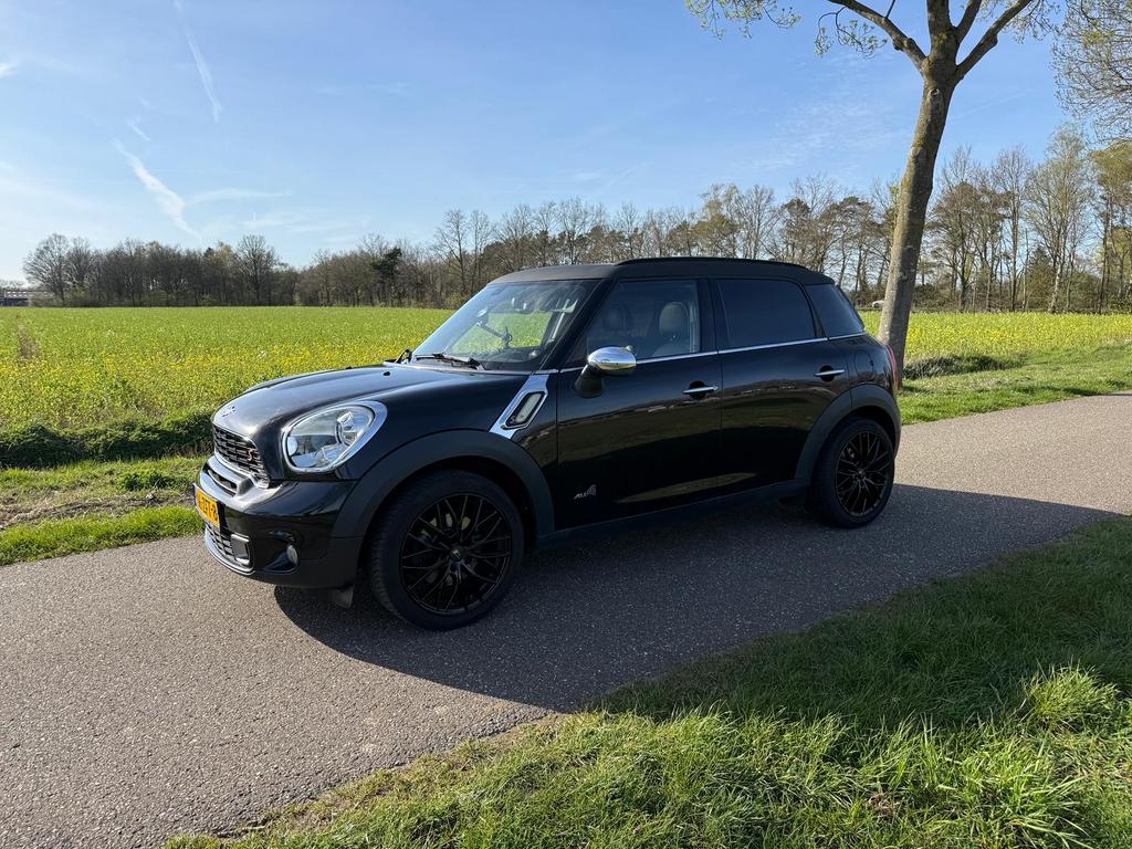Mini Countryman 1.6 Cooper S All4 2011 Zwart, Auto's, Mini, Particulier, Countryman, 4x4, Climate control, Dakrails, Lederen bekleding
