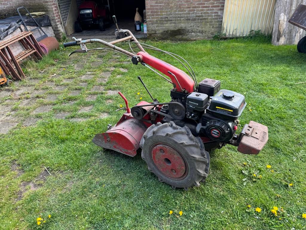 2-wiel tractor met frees, Ophalen
