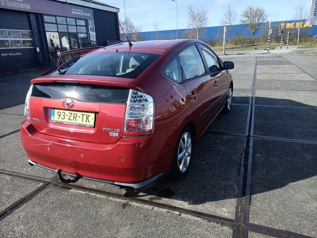 Toyota Prius 1.5 HSD 2008 Rood, Auto's, Toyota, 1497 cc, 4 cilinders, 23 km/l, Origineel Nederlands