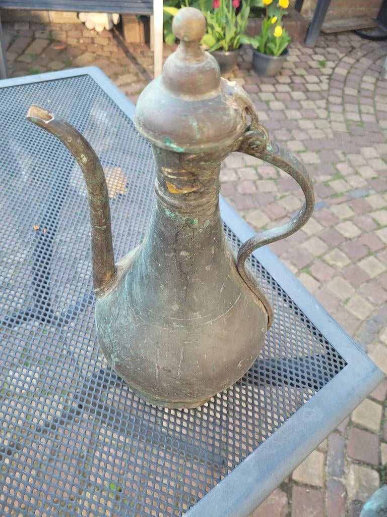 Kopern kan met deksel, Ophalen