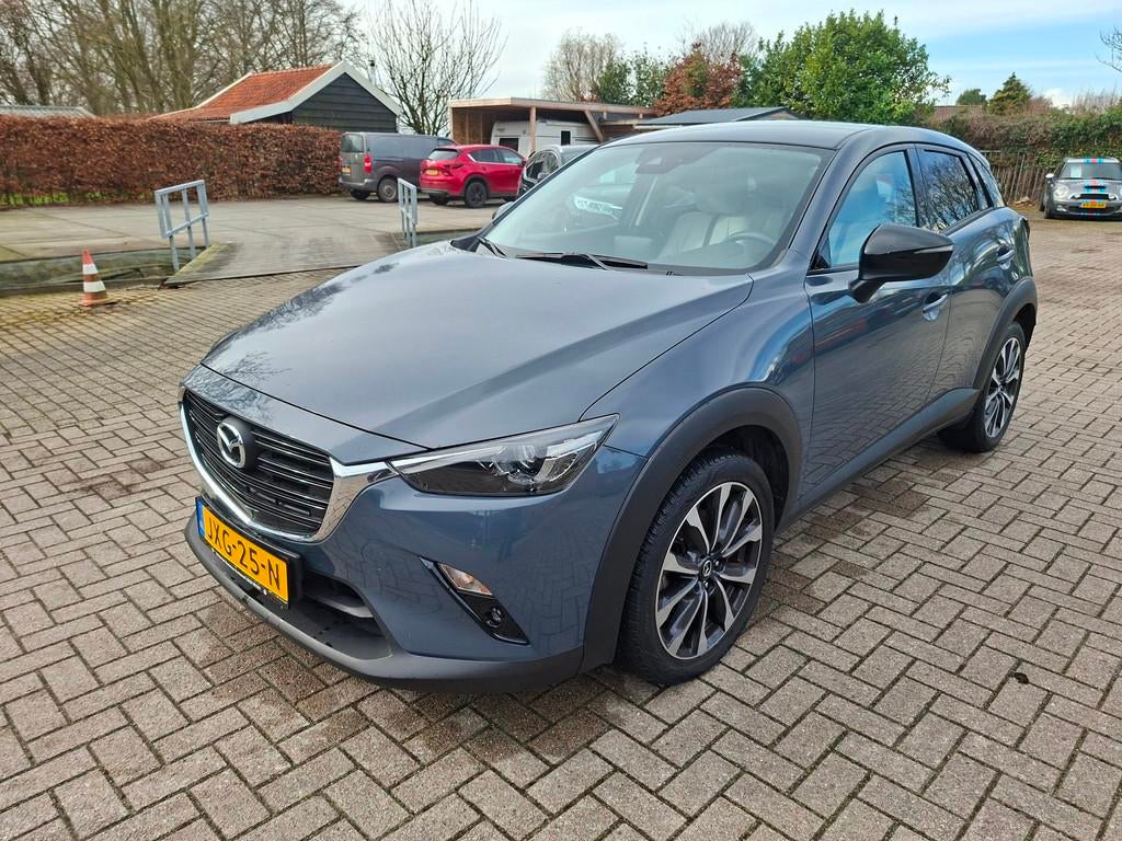 Mazda CX-3 2.0 SkyActiv-G 121 Luxury automaat carplay leer, Gebruikt, Euro 6, 4 cilinders, Lichtsensor