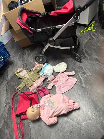 Baby Annabell met kinderwagen en kleertjes beschikbaar voor biedingen