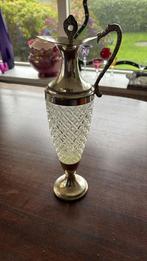 Antieke kristallen waterkan, Ophalen