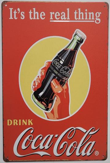 Coca Cola the real thing reclamebord van metaal wandbord  beschikbaar voor biedingen