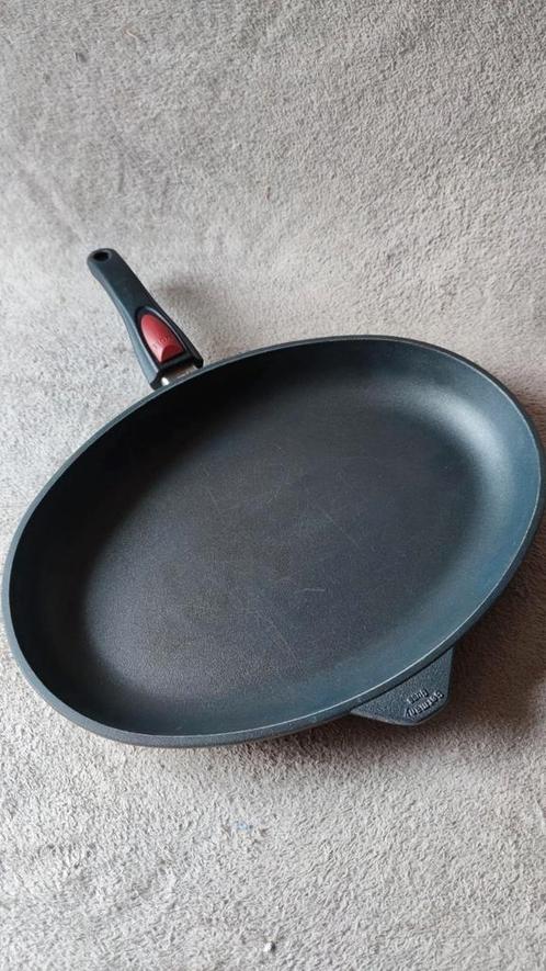 Woll NOWO induction line vispan, ovaal - 38x28,5x6 cm, Huis en Inrichting, Keuken | Potten en Pannen, Koekenpan of Braadpan, Aluminium