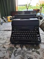 Vintage Remington Rand typemachine, Ophalen