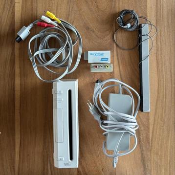 Nintendo Wii met spellen, stuurtjes en wii balance board beschikbaar voor biedingen