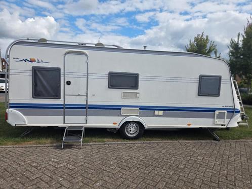 Mooie Hobby 560 uit 2003 te koop aangeboden., Caravans en Kamperen, Caravans, Particulier, tot en met 6, 1250 - 1500 kg, Rondzit