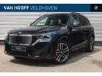 BMW iX1 eDrive20 High Executive M Sport / Panoramadak / Trek, Auto's, BMW, Stoelverwarming, Zwart, Zwart, Nieuw