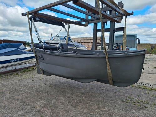 Whaly 450 Politileen sloep 8 pk 4 takt el start bimini top, Watersport en Boten, Sloepen, Gebruikt, Tot 10 pk, 3 tot 6 meter, Buitenboordmotor