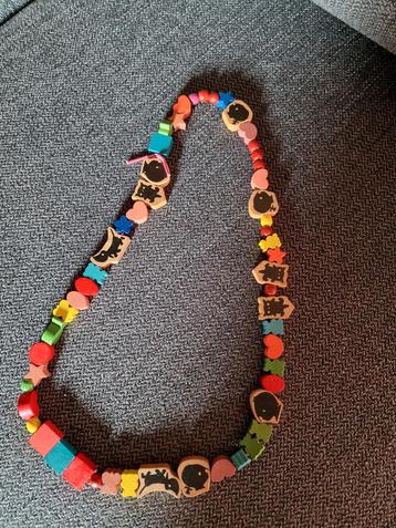 Houten kralenketting Jip en Janneke beschikbaar voor biedingen