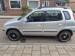 Suzuki Ignis 1.3 GL 2002 Grijs, Auto's, Suzuki, Voorwielaandrijving, 83 pk, Stof, Origineel Nederlands