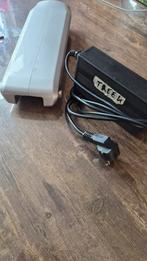 Trek Bionx Batterij + Lader, Ophalen of Verzenden, Gebruikt